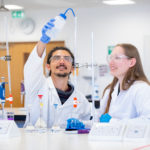 Anna (Right) in a practical lab session doing titrations.