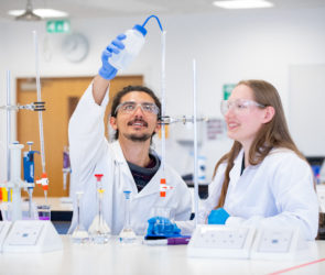 Anna (Right) in a practical lab session doing titrations.
